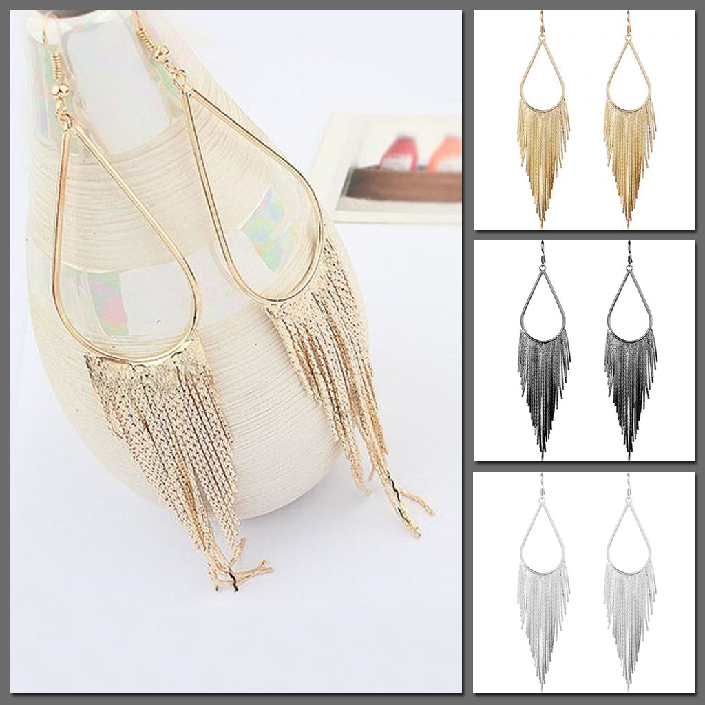 Jahzara Tassel Earrings - Long stylish statement dangles, featuring a hollow teardrop shape with tassels strung off it.