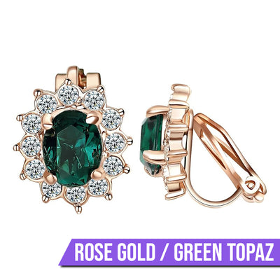 Juana Entourage Clip Earrings - A lovely, classic style earring featuring one large stone surrounded by 12 smaller stones.