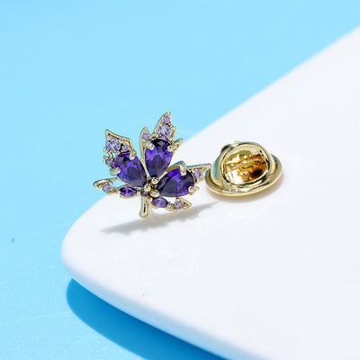 Kaede Maple Leaf Lapel Pin - A tiny sparkly crystal lapel pin shaped like a maple leaf, available in green or purple.