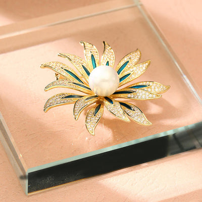Kamla Lotus Blossom Enamel Brooch - A large decorative brooch shaped like a multi-petalled flower, available in blue/silver, green/gold, or rainbow colours.