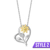 The Kelly Sunflower Heart Necklace - An elegant floral-themed necklace featuring a platinum plated heart with a beautiful yellow gold sunflower, and sparkling crystals.