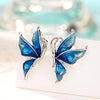 Lacquer Wings Enamel Earrings - Vibrantly colourful enamel earrings with a butterfly motif, available in blue, green, orange, and purple.