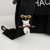 Little Adventurer Climbing Kitten Brooch - An adorable 3D sculpted resin kitten hanging from a stylised branch.