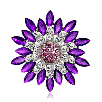 Lorrin Oversized Crystal Blossom Brooch - A large crystal blossom formed from rings of purple and white crystals arranged to form a floral pattern.
