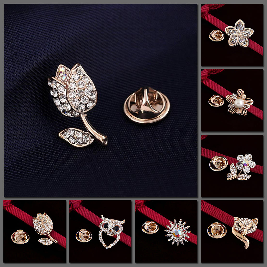 L'Petite Lapel Pins - An assortment of tiny crystal brooches in a variety of designs, including floral, foxes, birds, and geometric patterns.