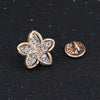 L'Petite Lapel Pins - An assortment of tiny crystal brooches in a variety of designs, including floral, foxes, birds, and geometric patterns.