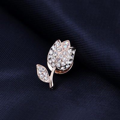 L'Petite Lapel Pins - An assortment of tiny crystal brooches in a variety of designs, including floral, foxes, birds, and geometric patterns.