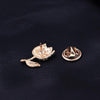 L'Petite Lapel Pins - An assortment of tiny crystal brooches in a variety of designs, including floral, foxes, birds, and geometric patterns.