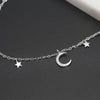 Luna Moon & Stars Charm Bracelet - A very delicate silver coloured charm bracelet decorated with moon and stars charms.