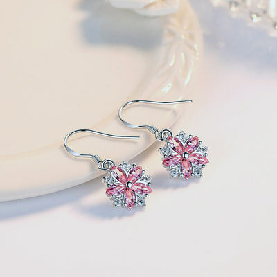 Asuka Cherry Blossom French Hook Earrings - Small, delicate crystal earrings shaped like little flowers.