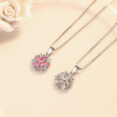 Asuka Cherry Blossom Necklace - Small, delicate crystal flower pendant on a silver box chain, with either pink or white stones.