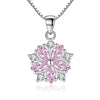 Asuka Cherry Blossom Necklace - Small, delicate crystal flower pendant on a silver box chain, with either pink or white stones.