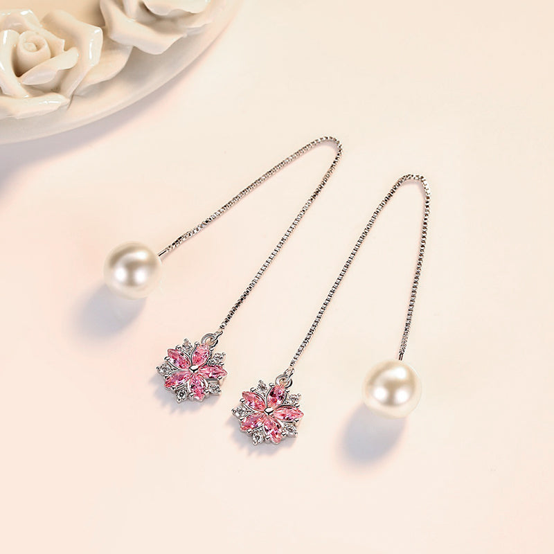 Asuka Cherry Blossom Tassel Drop Earrings - Small, delicate crystal flowers suspended from a long silver threader earring.