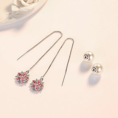 Asuka Cherry Blossom Tassel Drop Earrings - Small, delicate crystal flowers suspended from a long silver threader earring.