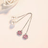 Asuka Cherry Blossom Tassel Drop Earrings - Small, delicate crystal flowers suspended from a long silver threader earring.