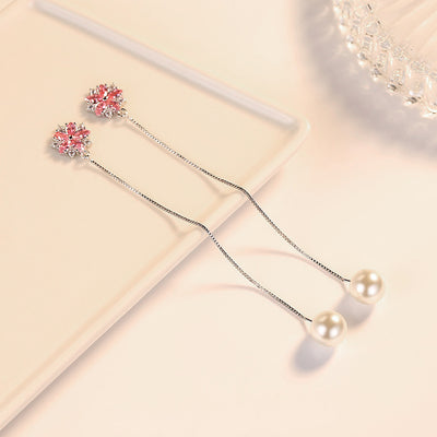 Asuka Cherry Blossom Tassel Drop Earrings - Small, delicate crystal flowers suspended from a long silver threader earring.