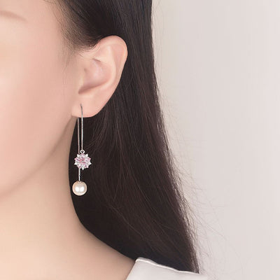 Asuka Cherry Blossom Tassel Drop Earrings - Small, delicate crystal flowers suspended from a long silver threader earring.