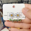 Maisey Crystal Daisy Stud Earrings - Small, delicate daisy-themed earrings, formed from a mixture of white quartz, and green and yellow topaz.