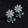 Maisey Crystal Daisy Stud Earrings - Small, delicate daisy-themed earrings, formed from a mixture of white quartz, and green and yellow topaz.