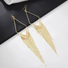 Malaika Tassel Earrings - Long stylish statement dangles, featuring a hollow diamond shape with tassels strung off it.