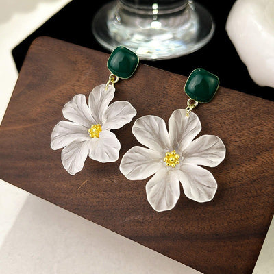 Margaret Apple Blossom Drop Earrings - Lovely stylised white apple blossom earrings sculpted from semi-translucent white acetate, suspended from a green enamel earring finding.