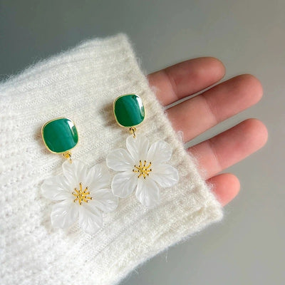 Margaret Apple Blossom Drop Earrings - Lovely stylised white apple blossom earrings sculpted from semi-translucent white acetate, suspended from a green enamel earring finding.