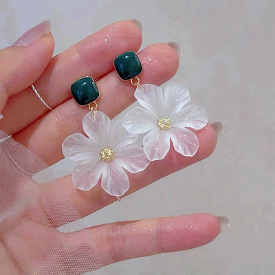 Margaret Apple Blossom Drop Earrings - Lovely stylised white apple blossom earrings sculpted from semi-translucent white acetate, suspended from a green enamel earring finding.
