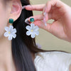 Margaret Apple Blossom Drop Earrings - Lovely stylised white apple blossom earrings sculpted from semi-translucent white acetate, suspended from a green enamel earring finding.