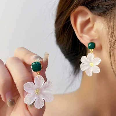 Margaret Apple Blossom Drop Earrings - Lovely stylised white apple blossom earrings sculpted from semi-translucent white acetate, suspended from a green enamel earring finding.