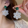 Margaret Apple Blossom Drop Earrings - Lovely stylised white apple blossom earrings sculpted from semi-translucent white acetate, suspended from a green enamel earring finding.