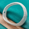 Marissa Braided Mesh Bangle - A simple, classic metal mesh bangle made from bright silver.