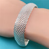 Marissa Braided Mesh Bangle - A simple, classic metal mesh bangle made from bright silver.