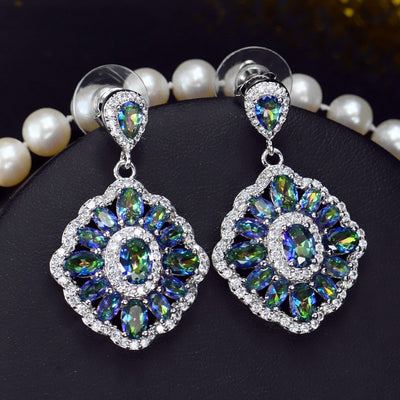 Marisse Luxury Crystal Dangle Earrings - Elegant cluster earrings featuring brilliant mystic stones surrounded by sparkling white quartz.