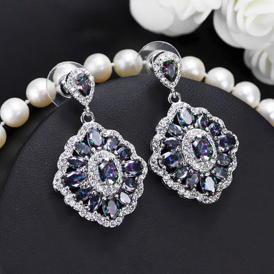 Marisse Luxury Crystal Dangle Earrings - Elegant cluster earrings featuring brilliant mystic stones surrounded by sparkling white quartz.