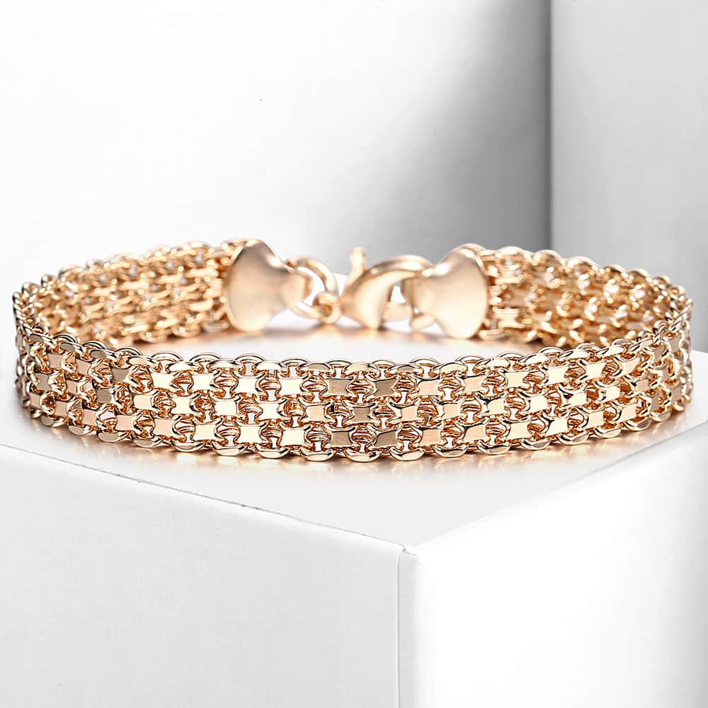 Medea Multi-Layer Rolo Chain Bracelet - An elegant rose gold bracelet made of interlocking links and plates.