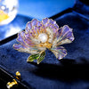 Megan Ruffled Blossom Resin Brooch - An elegant floral brooch available in blue-green, hot pink, purple, or soft pink, with shimmering crystals and semi-translucent resin.