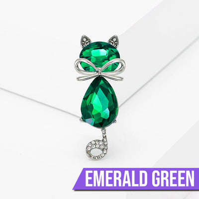 Mimmy Crystal Cat Brooch - A cute, stylised cat brooch featuring large coloured crystals for the head and body, and small round white quartz set into the ears and tail.