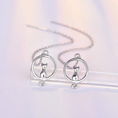 Moonlight Meowl Set - A delicate sterling silver jewellery set featuring a tiny kitty sitting on a crescent moon.