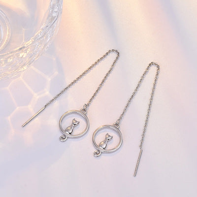 Moonlight Meowl Set - A delicate sterling silver jewellery set featuring a tiny kitty sitting on a crescent moon.