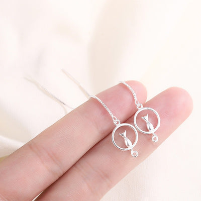 Moonlight Meowl Set - A delicate sterling silver jewellery set featuring a tiny kitty sitting on a crescent moon.