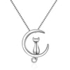 Moonlight Meowl Set - A delicate sterling silver jewellery set featuring a tiny kitty sitting on a crescent moon.