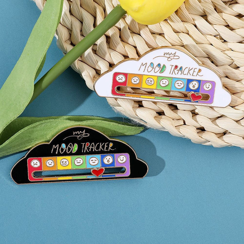 My Mood Tracker Enamel Brooch - A cute enamel brooch with a sliding scale indicating moods, and a little heart that can be moved along to indicate the wearer's current mood.