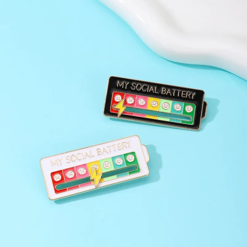 My Social Battery Enamel Brooch - A cute enamel brooch with a sliding scale indicating moods, and a little lightning bolt that can be moved along to indicate the wearer's current mood.