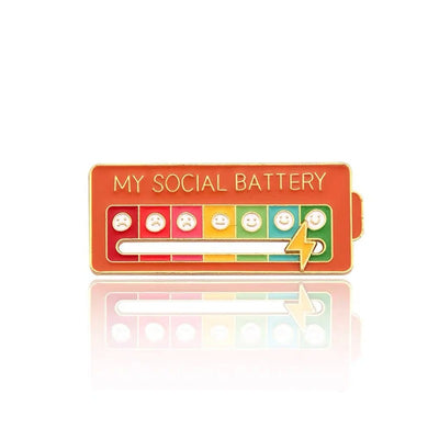My Social Battery Enamel Brooch - A cute enamel brooch with a sliding scale indicating moods, and a little lightning bolt that can be moved along to indicate the wearer's current mood.