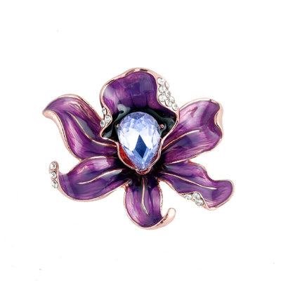 The Odessa Enamel Orchid Brooch - A lovely flower-themed brooch featuring six wavy petals around a large teardrop-shaped central stone.