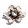 The Odessa Enamel Orchid Brooch - A lovely flower-themed brooch featuring six wavy petals around a large teardrop-shaped central stone.