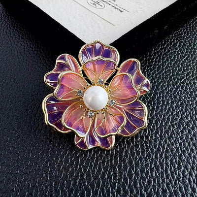 The Ophelia Peony Sculpted Resin Brooch - An elegant floral brooch available in green, salmon, purple, or ombre sunset, with shimmering crystals and semi-translucent resin.