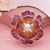 The Ophelia Peony Sculpted Resin Brooch - An elegant floral brooch available in green, salmon, purple, or ombre sunset, with shimmering crystals and semi-translucent resin.