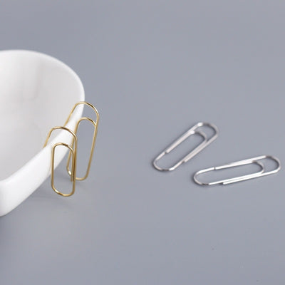 Pamela Posh Paperclip Earrings - A cool, stylish pair of earrings made to look like simple paperclips, but made from beautiful 925 Sterling Silver and 14 karat yellow gold.