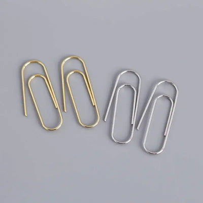 Pamela Posh Paperclip Earrings - A cool, stylish pair of earrings made to look like simple paperclips, but made from beautiful 925 Sterling Silver and 14 karat yellow gold.